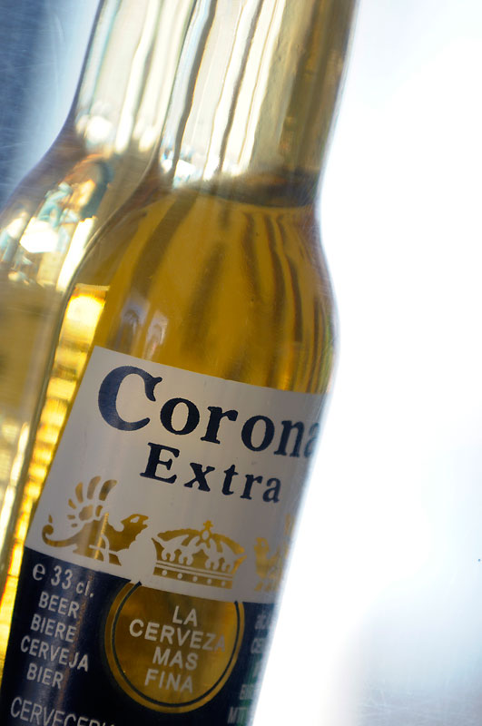 A row of full Corona beer bottles