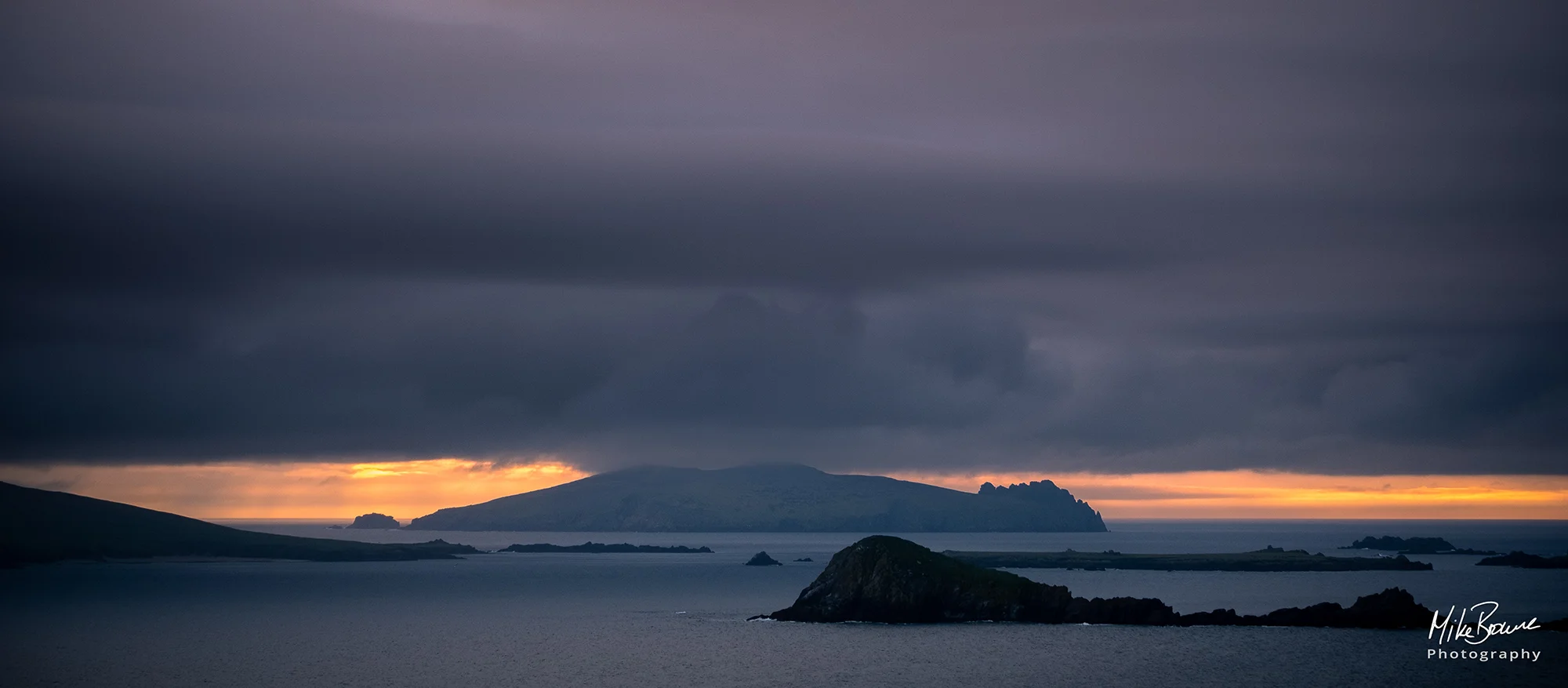 An Fear Marbh Sleeping Giant island at sunset on a stormy evening