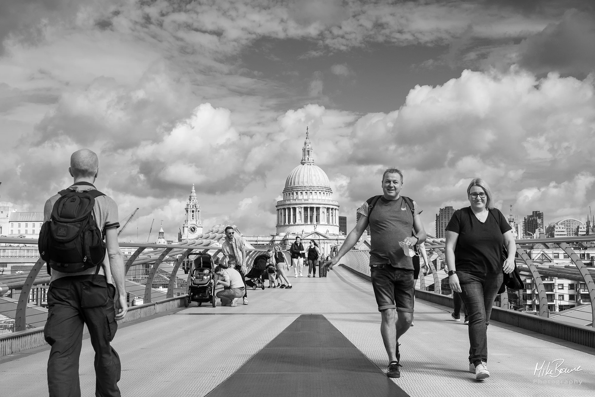 The Millennium Bridge leading to St Paul\'s Cathedral with pedestrians
