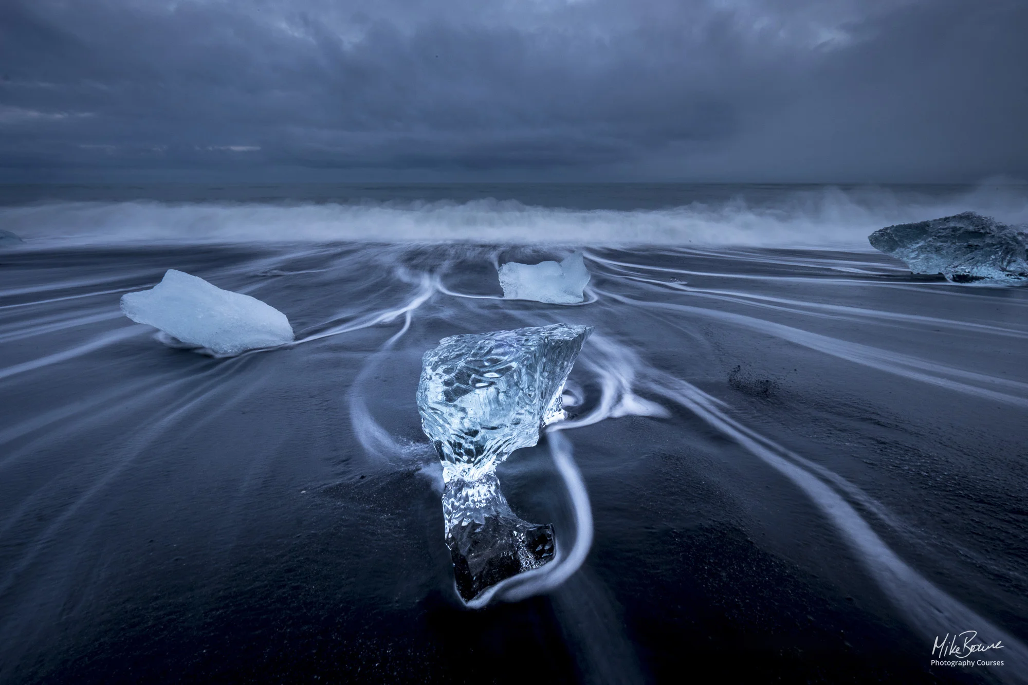 Scattered icebergs on Diamond beach in Iceland