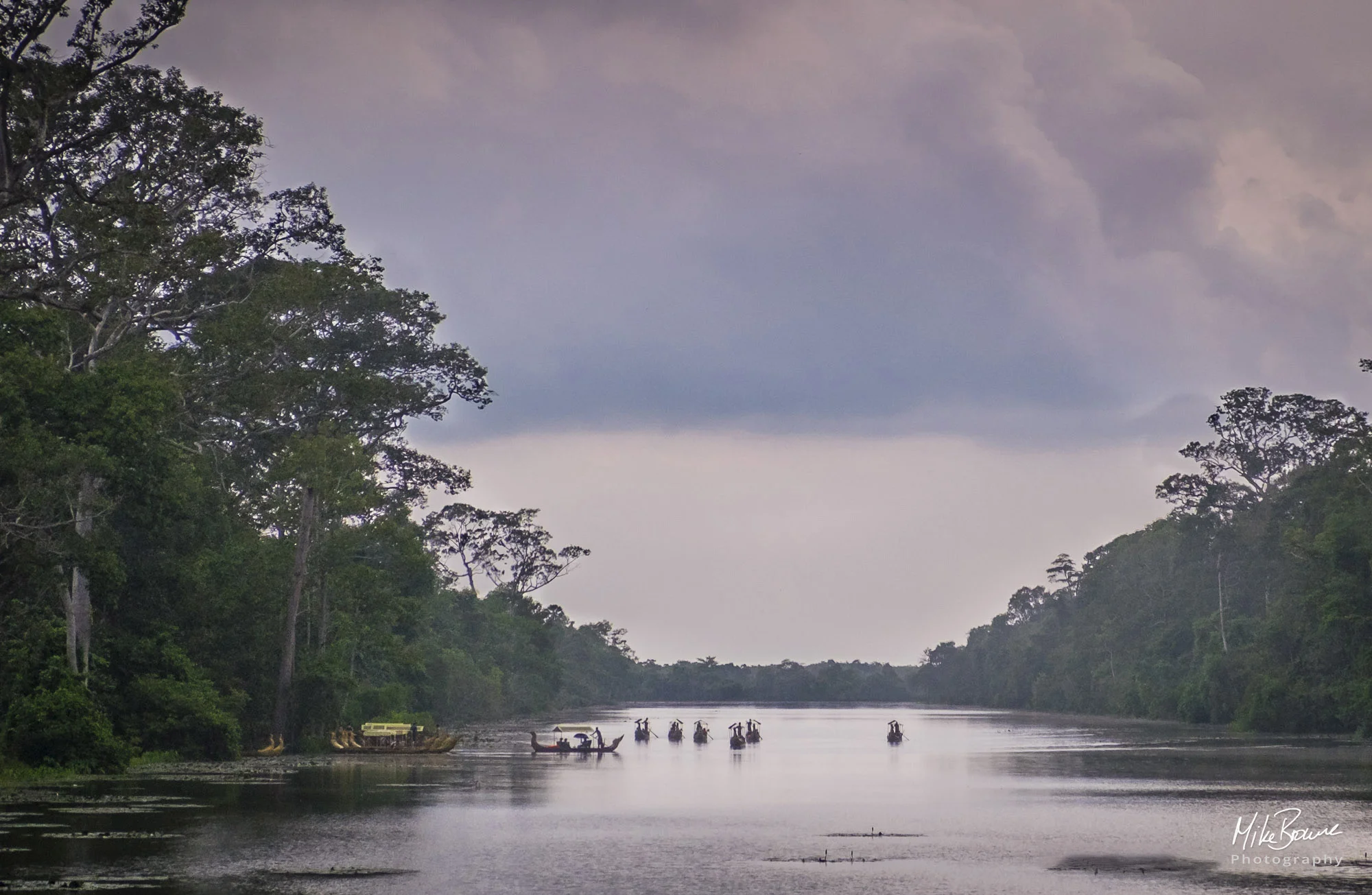 Tiny boats turn to the shore on the Baray at Angkor Watt, Cambodia