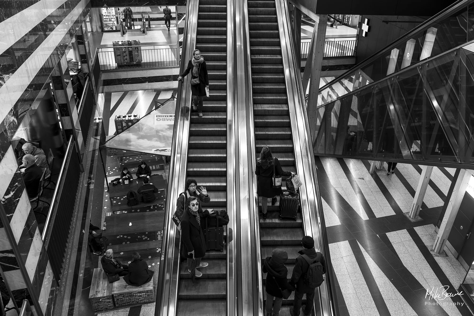 People on escalator at hauptbahnhof zürich