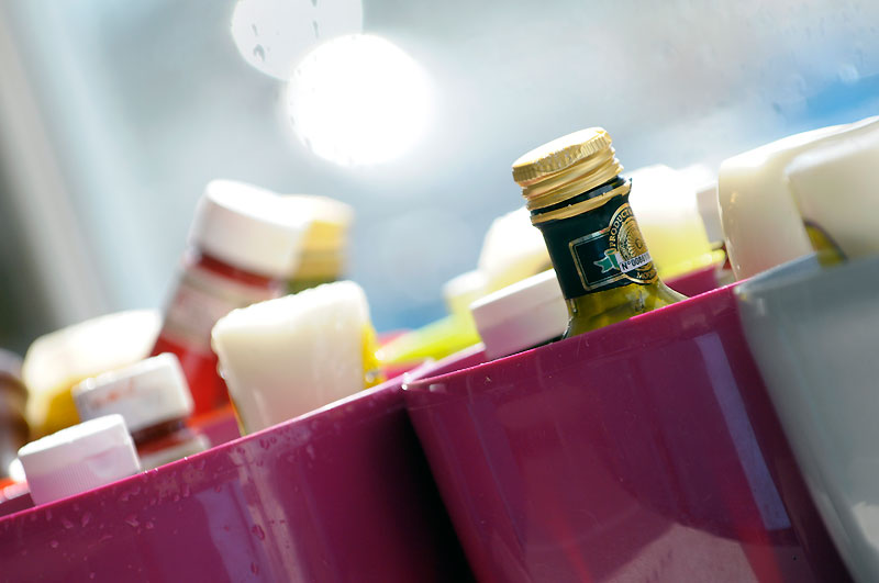 Containers of condiments in a cafe