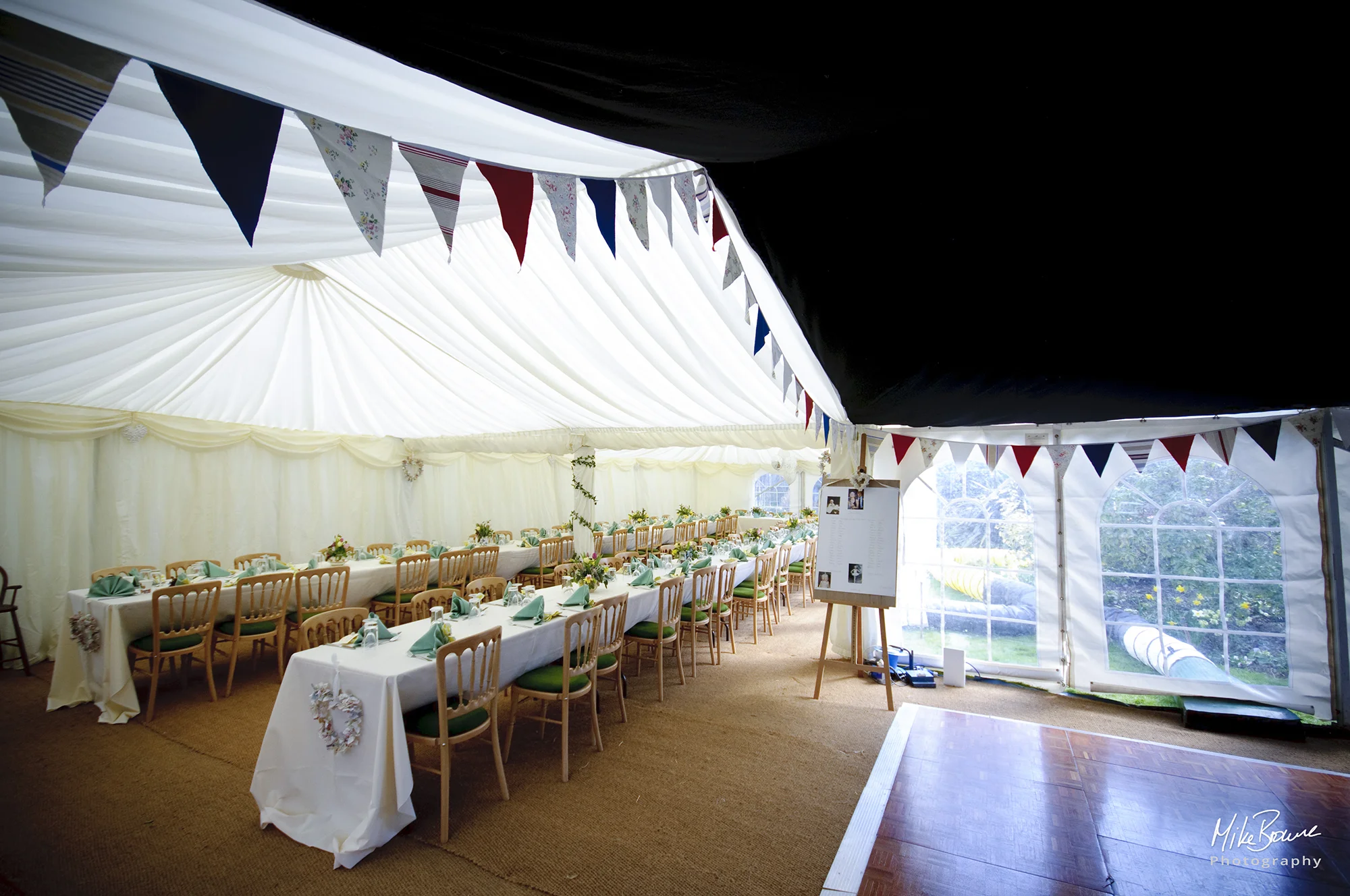 Interior of a wedding marquee ready to receive guests